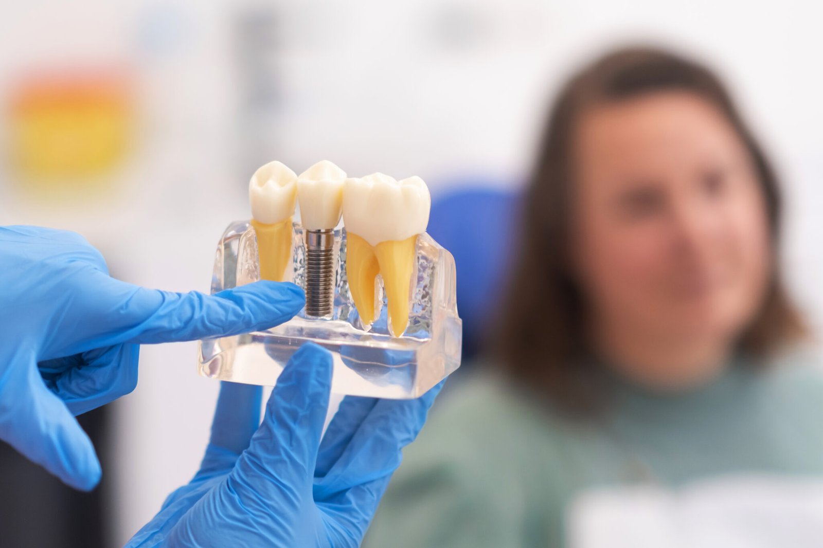 A dentist discussing a treatment plan with an international patient