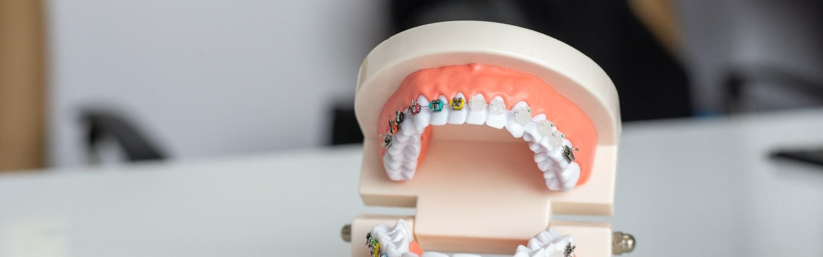 white and brown ceramic cake figurine